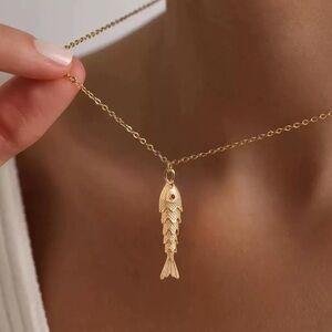 Anthropologie moving Tail Gold Fish Pendant Necklace